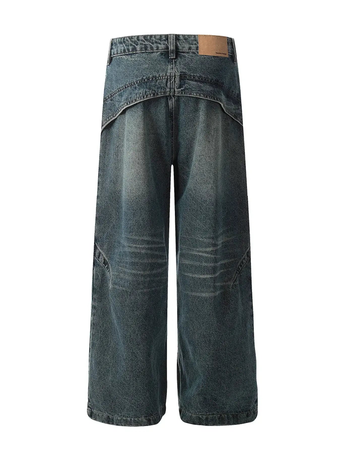 Back view of vintage washed wide leg baggy jeans for men, featuring distressed details and relaxed fit.