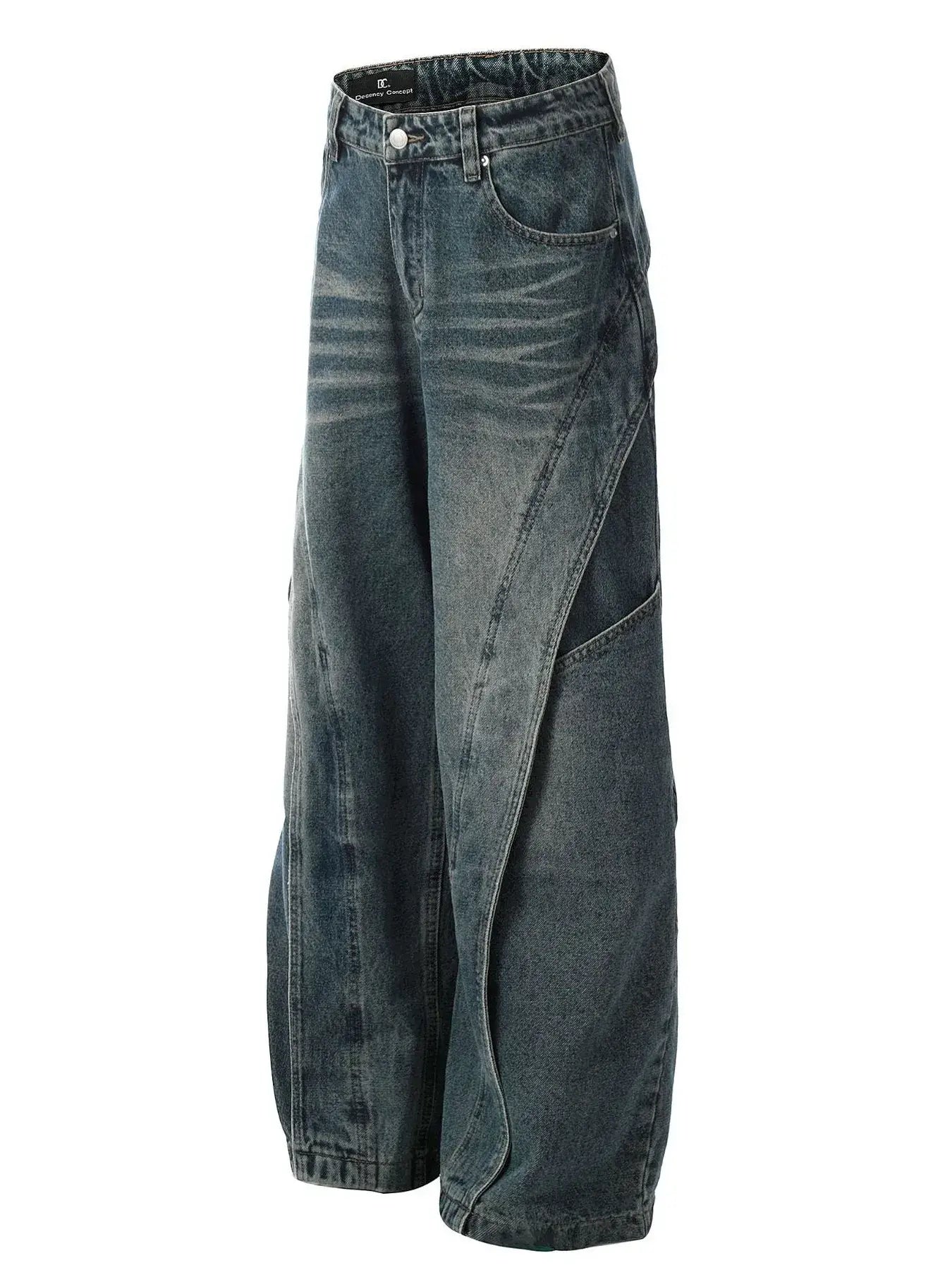 Vintage washed wide leg baggy jeans for men with distressed details and unique seam detailing.