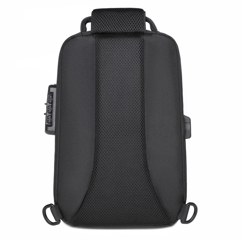 Back view of an anti-theft travel crossbody bag with a sleek design and USB charging port.