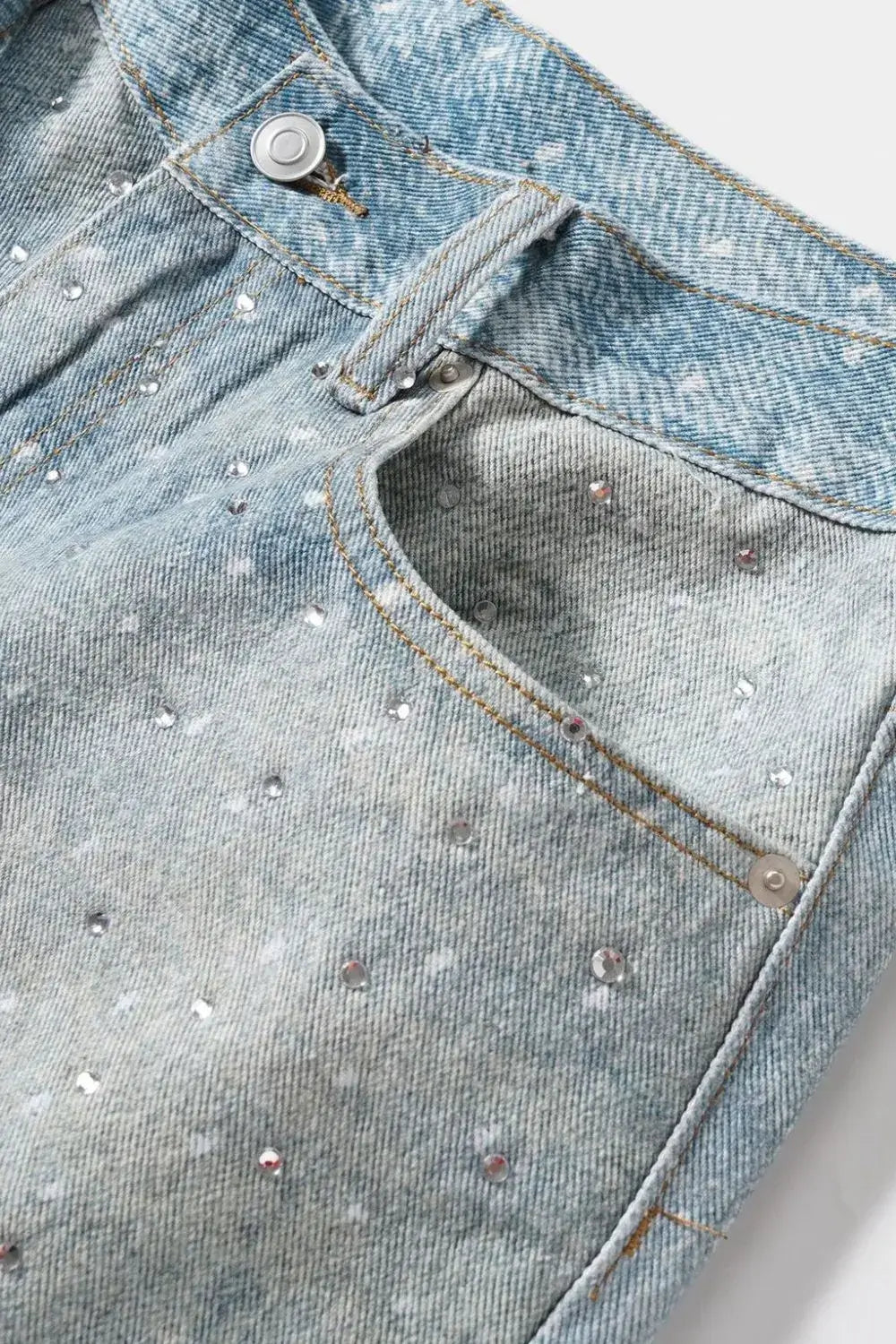 Close-up of Galaxy Rhinestone Shorts for men, featuring a denim fabric with sparkly rhinestones for a stylish streetwear look.